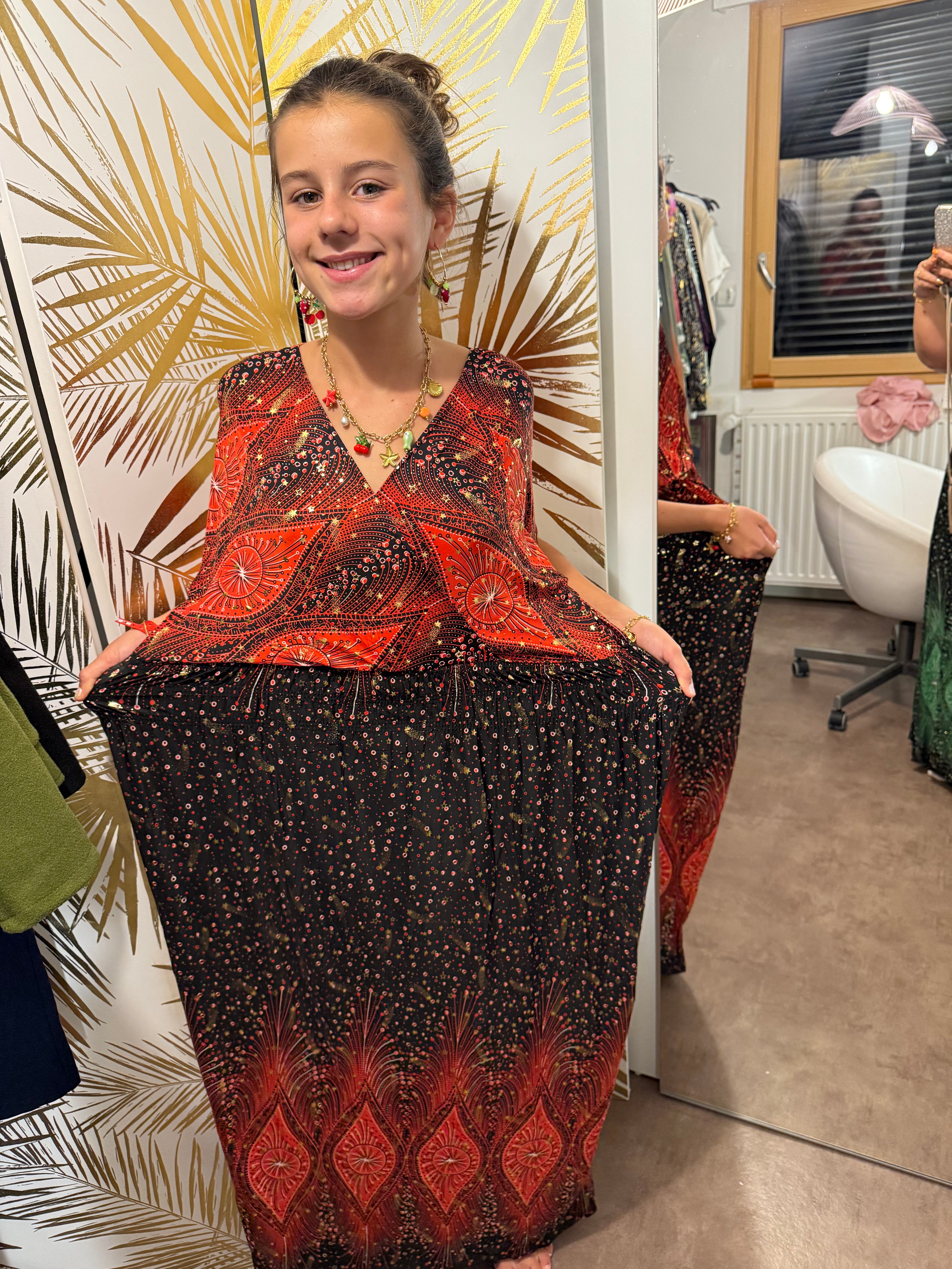 Robe magique rouge à étoiles