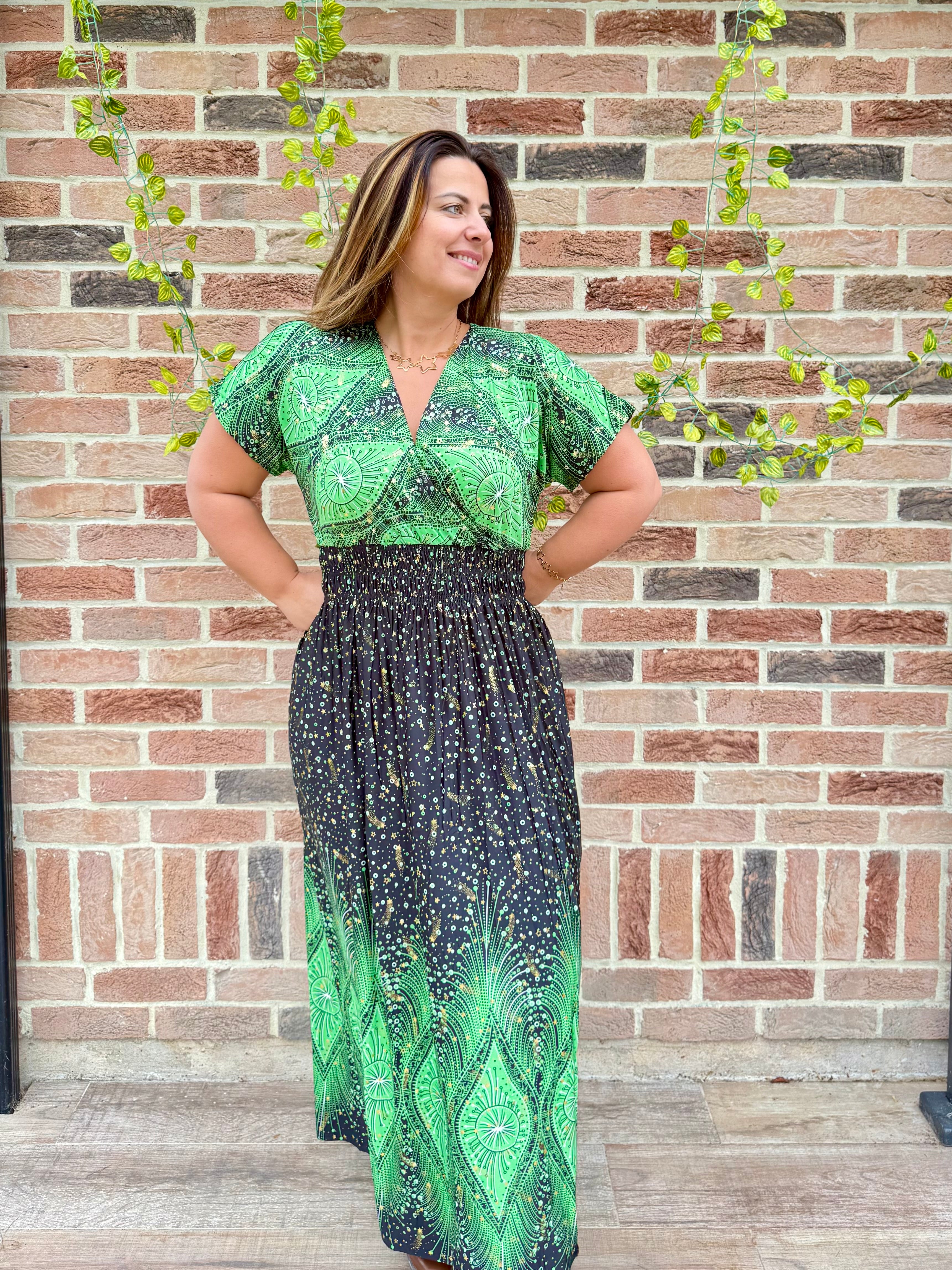 Robe magique verte à étoiles