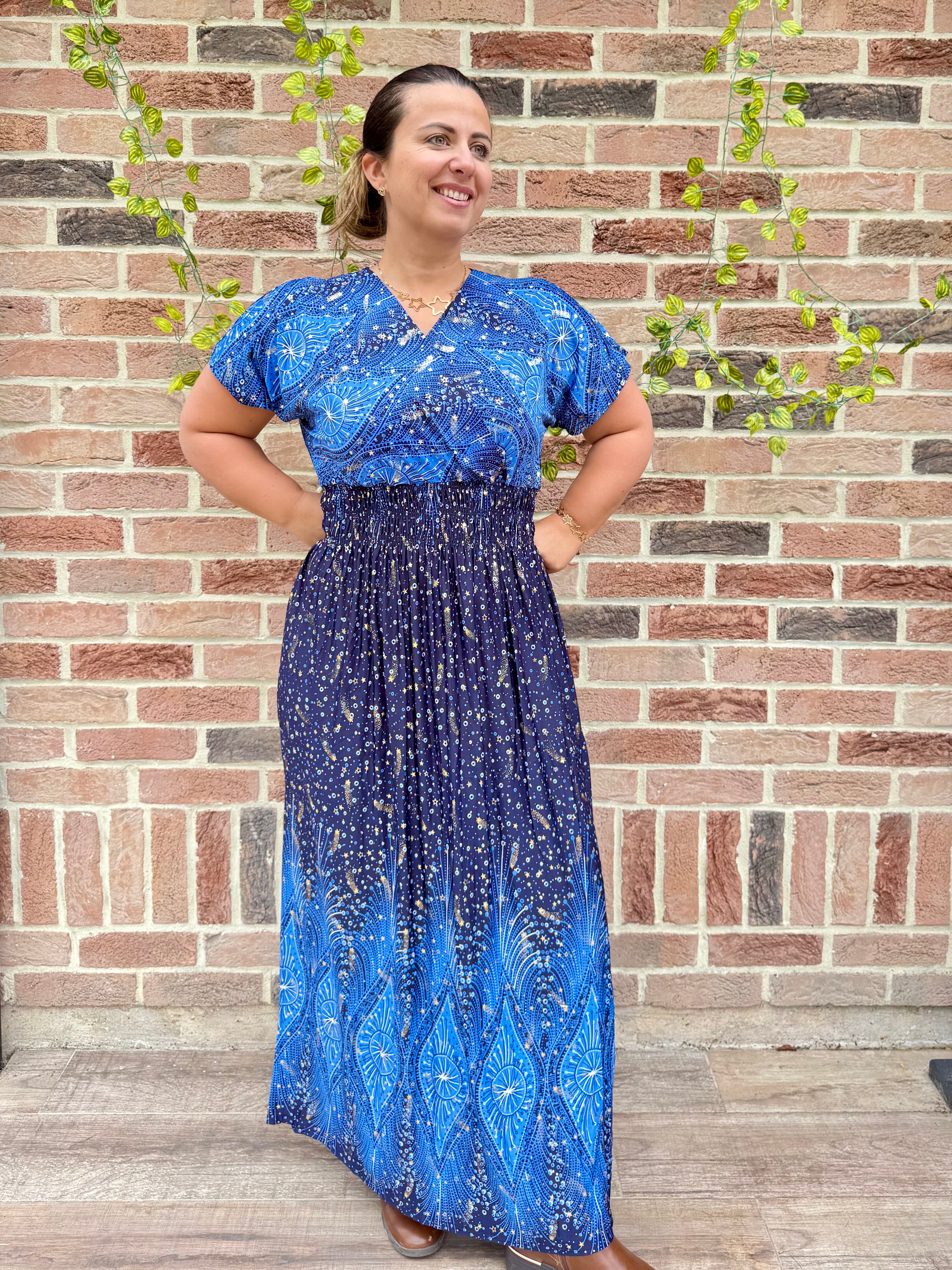 Robe magique bleue à étoiles
