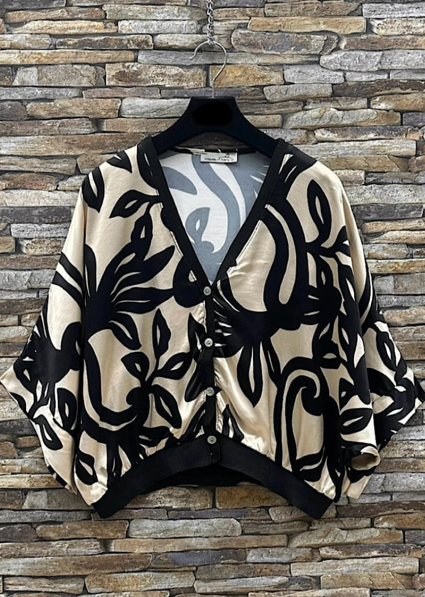 Boléro de soie noir et beige